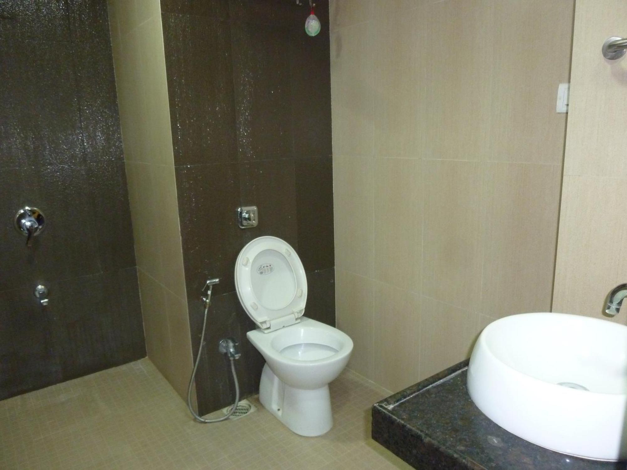 Hotel Regal Palace Bombaim Quarto foto